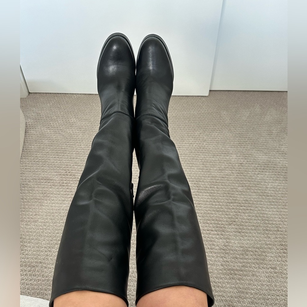 Pre-loved Stuart Weitzman high heel tall boots. Blk leather Sz 7.5 great condito